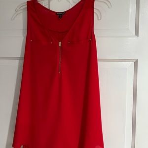Express Red (not pink) top L /front is polyester/ back  a stretchy rayon cotton.